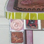 A chair with mosaic tiles, a tooled leather seat all featuring the pug dog breed